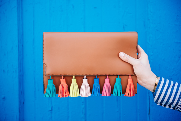 colorful handbag with tassels on it