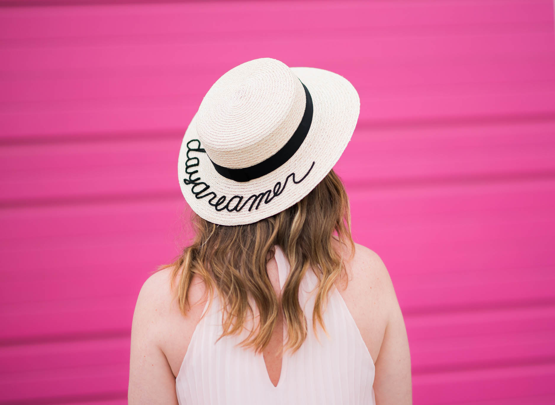 eugenia kim fedora with sayings on them