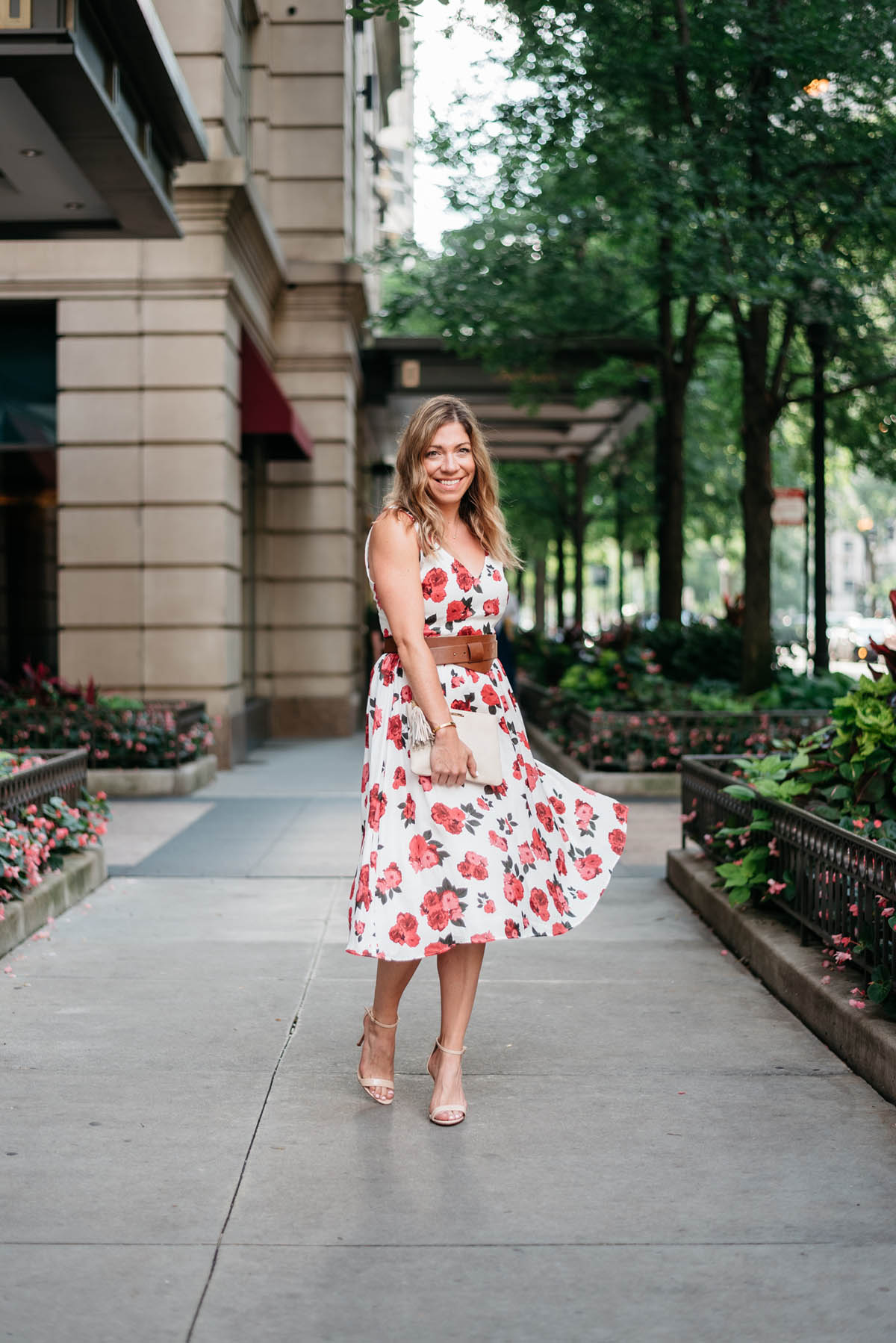 hallie wilson chicago lifestyle blogger wearing a bb dakota flora dress and another line belt