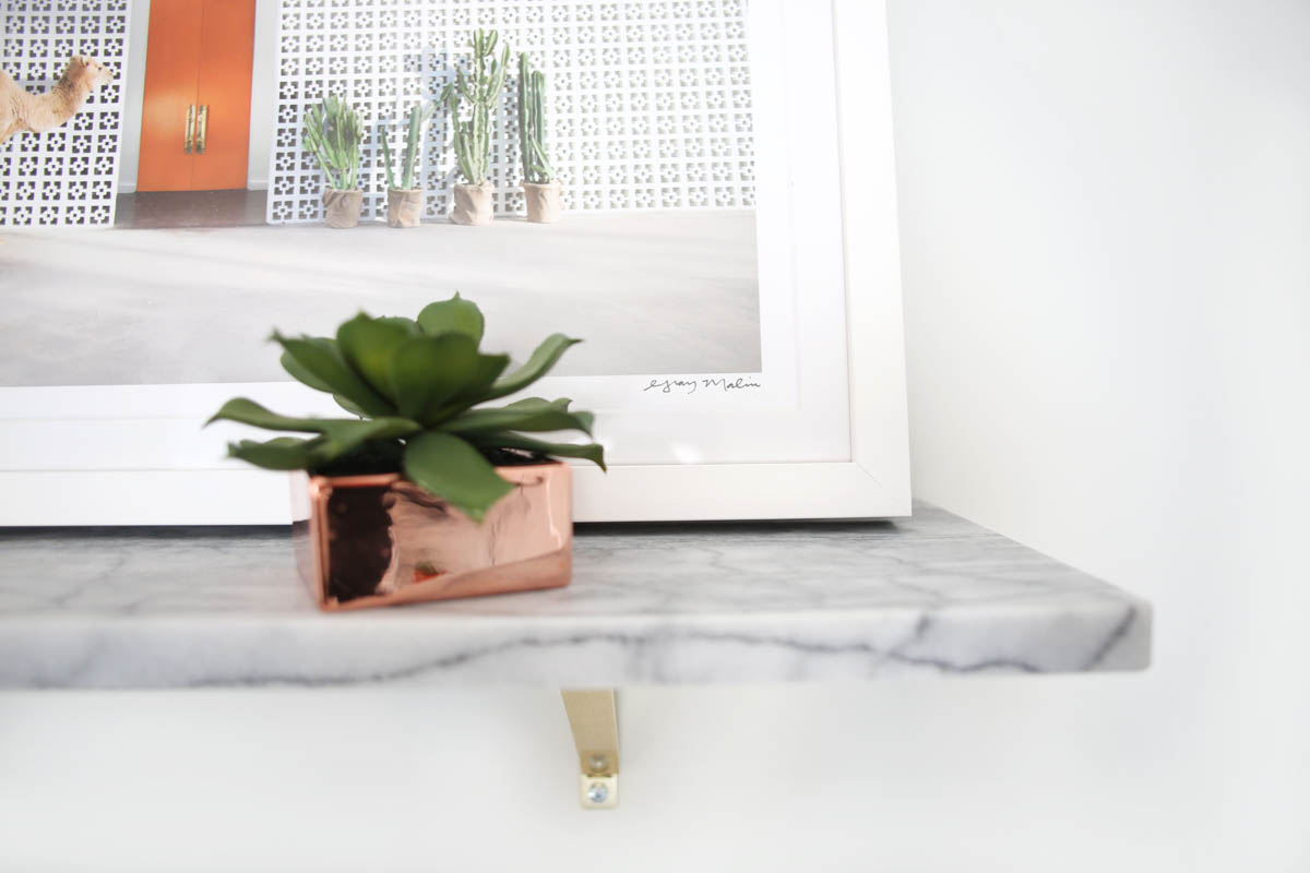 lifestyle blogger hallie wilson shows how to decorate with succulents